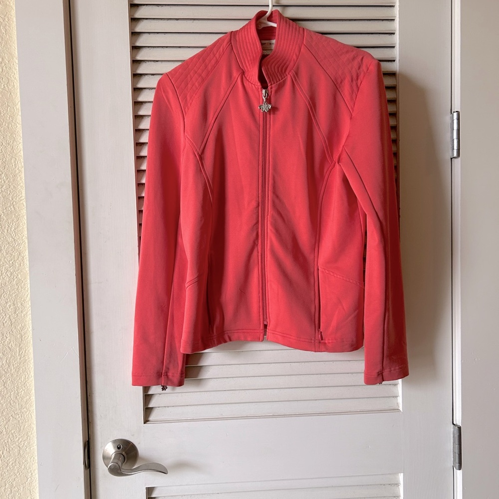 Tangerine colored zip up Jacket size large polyester and spandex